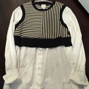 White shirt with striped vest